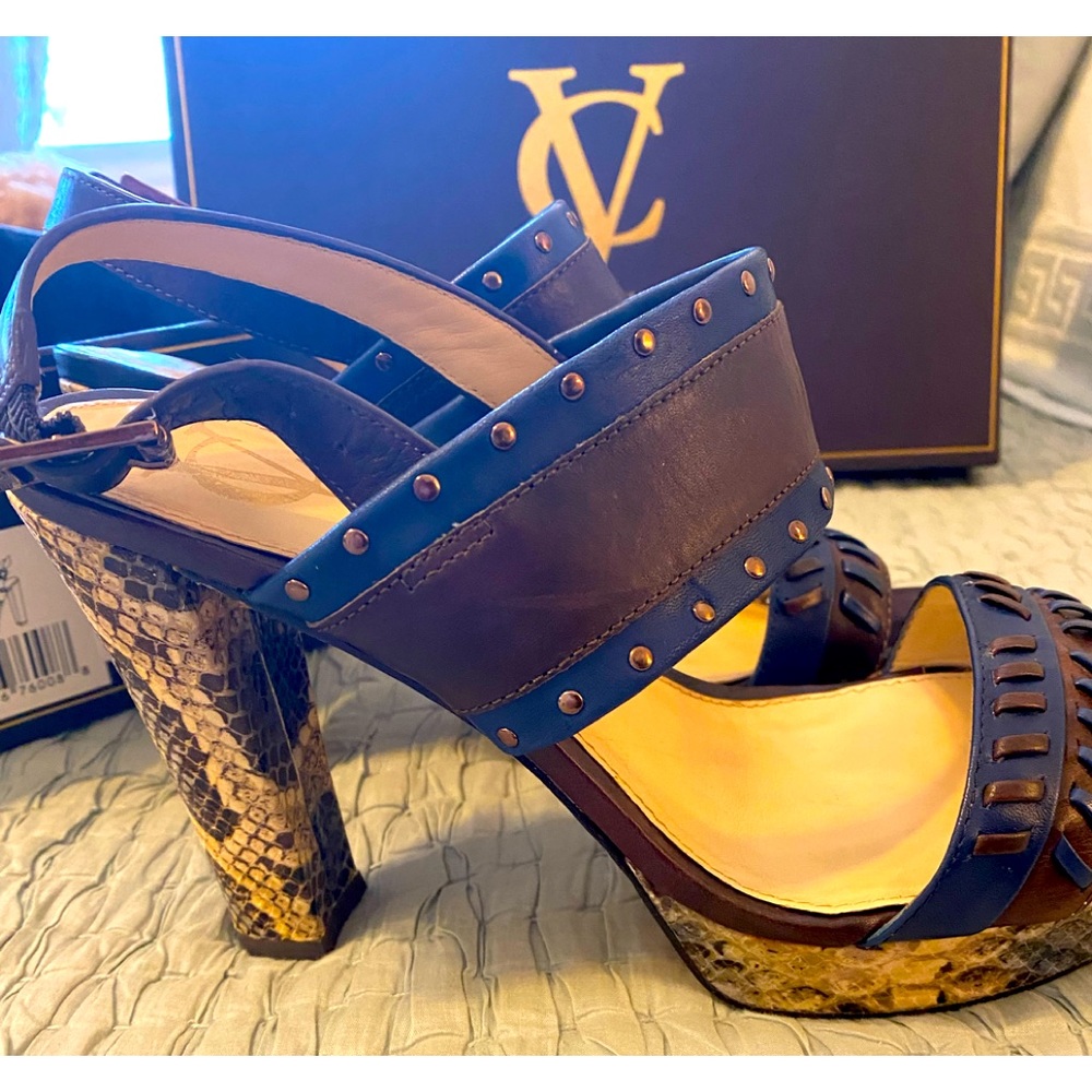 Elegant high heel platform sandals size 8M in excellent condition.